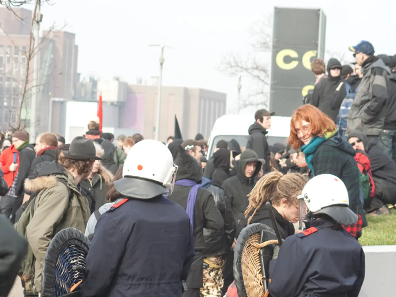 Law enforcement officers undergoing exercise simulating emergency situation at Ratekau school